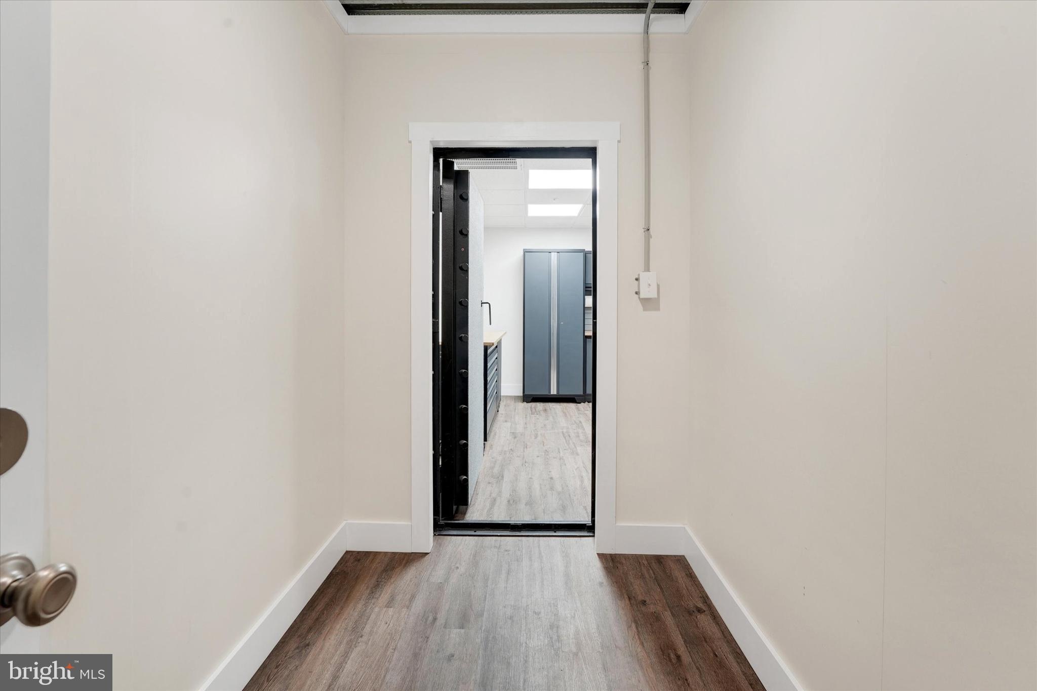 249 Floral Way Rising Sun, MD 21911 - Photo 62 of 65 a view of a hallway with wooden floor