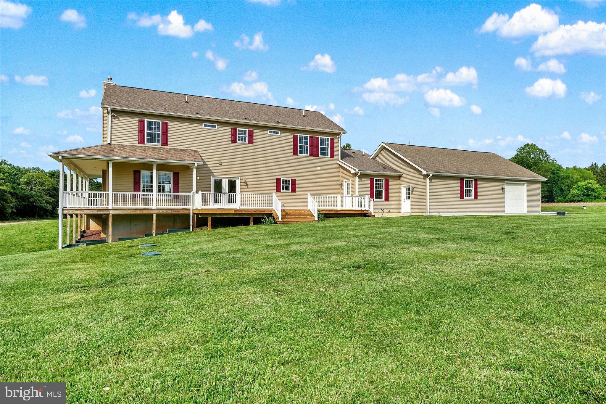 249 Floral Way Rising Sun, MD 21911 - Photo 9 of 65 a house view with a garden space