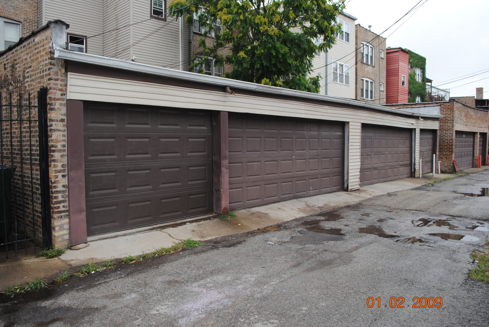 7635 South Yates Boulevard Chicago, IL 60649 - Photo 17 of 17 a couple of potted plants in front of door