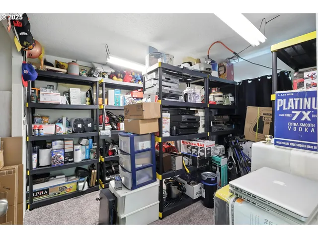 a store room with lots of wooden furniture