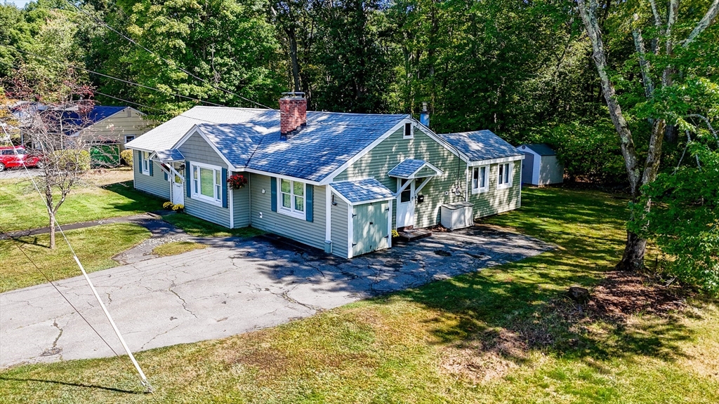 19 Reo Road Maynard, MA 01754 - Photo 2 of 41 a view of a house with a yard