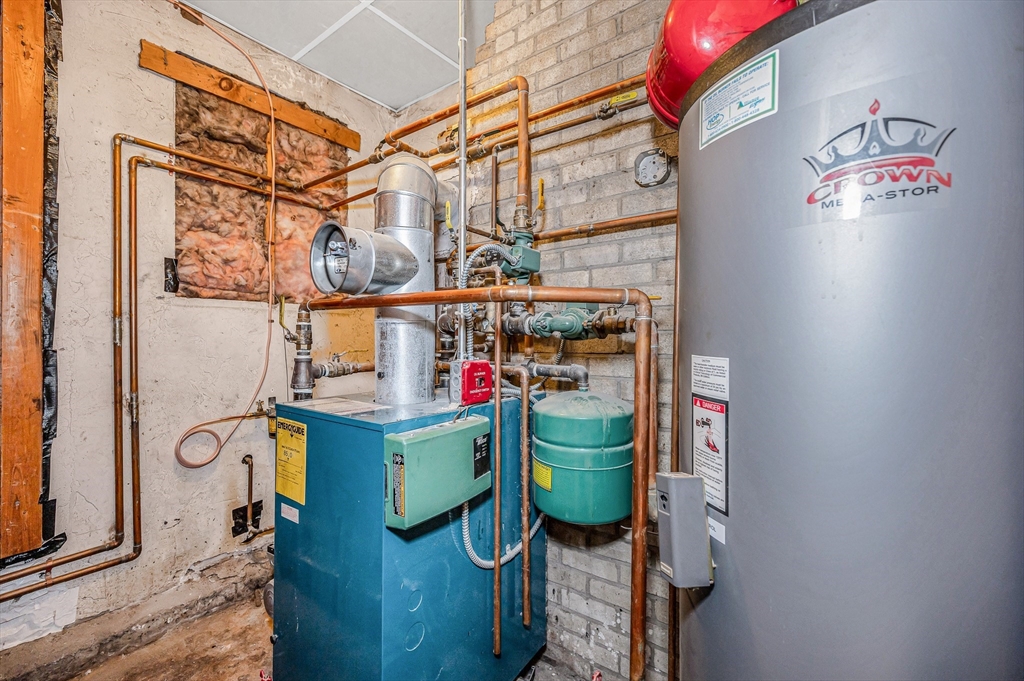 19 Reo Road Maynard, MA 01754 - Photo 25 of 41 a utility room with fridge dryer and washer