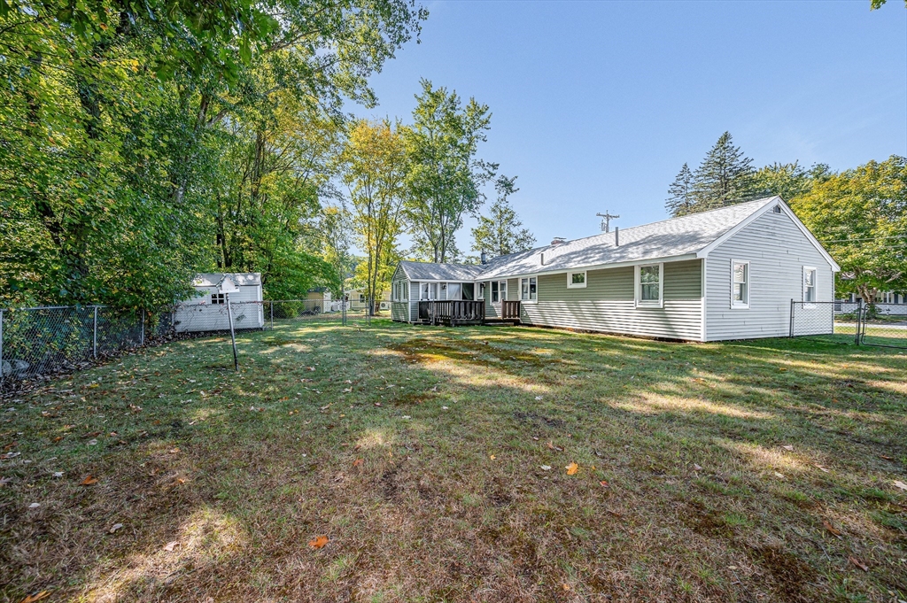 19 Reo Road Maynard, MA 01754 - Photo 32 of 41 a view of a house with a yard