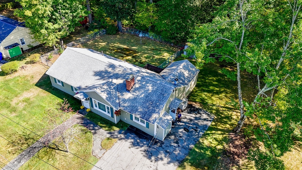 19 Reo Road Maynard, MA 01754 - Photo 36 of 41 an aerial view of a house with a yard basket ball court and outdoor seating