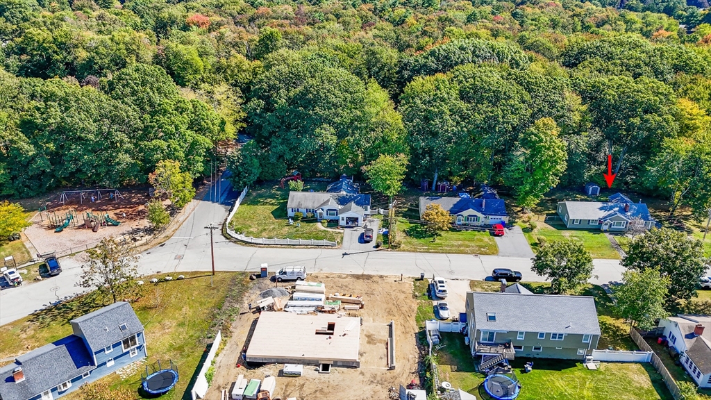 19 Reo Road Maynard, MA 01754 - Photo 38 of 41 an aerial view of a swimming pool patio and outdoor seating