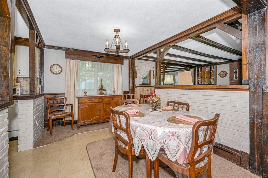 19 Reo Road Maynard, MA 01754 - Photo 7 of 41 a dining room with furniture and window