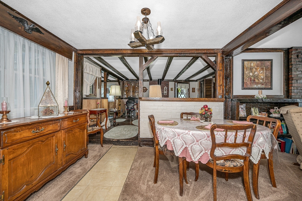 19 Reo Road Maynard, MA 01754 - Photo 8 of 41 a dining room with furniture and window