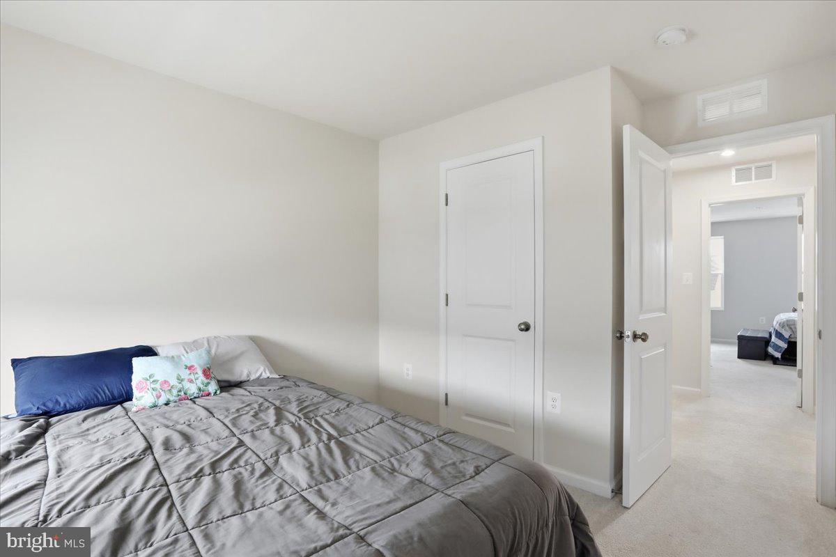 186 Coolidge Avenue Ranson, WV 25438 - Photo 24 of 41 Cozy bedroom with inviting light.