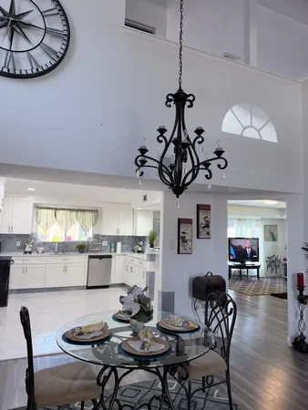 a view of a living room and dining room