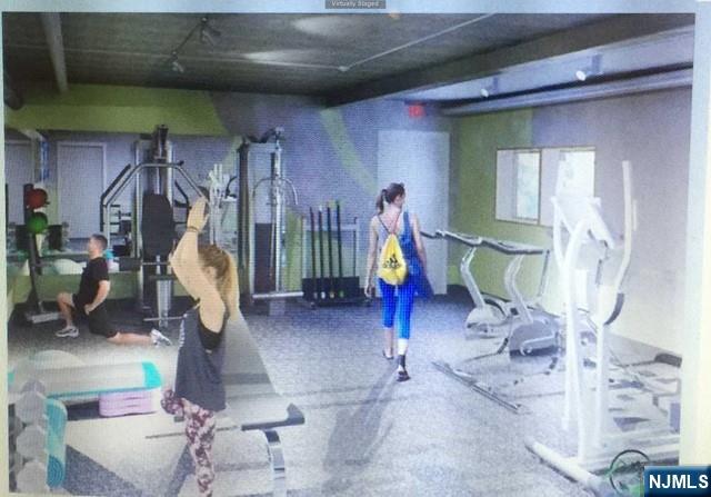 280-320 Oak Street, Unit 320C Ridgewood, NJ 07450 - Photo 20 of 25 a view of a room with gym equipment