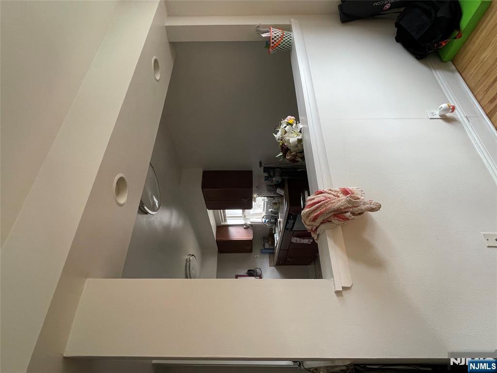 280-320 Oak Street, Unit 320C Ridgewood, NJ 07450 - Photo 10 of 25 a living room with furniture and a flat screen tv