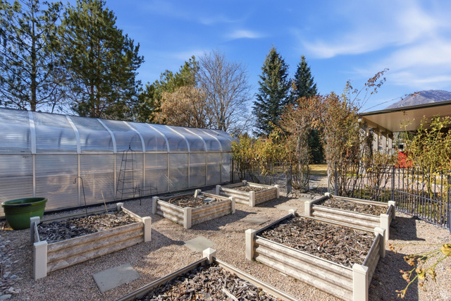 145 Carnesecca Court Mapleton, UT 84664 - Photo 85 of 109 View of patio / terrace featuring a greenhouse and a garden