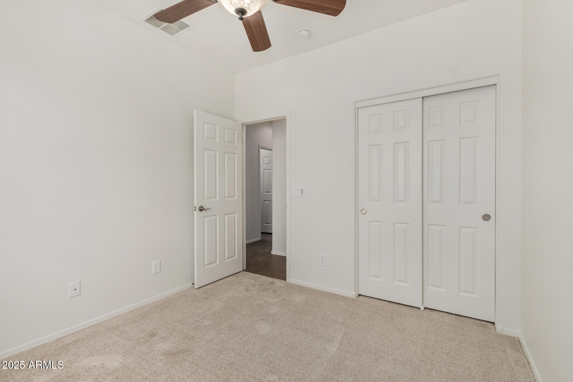 3313 West Gran Paradiso Drive Phoenix, AZ 85086 - Photo 23 of 31 an empty room with ceiling fan