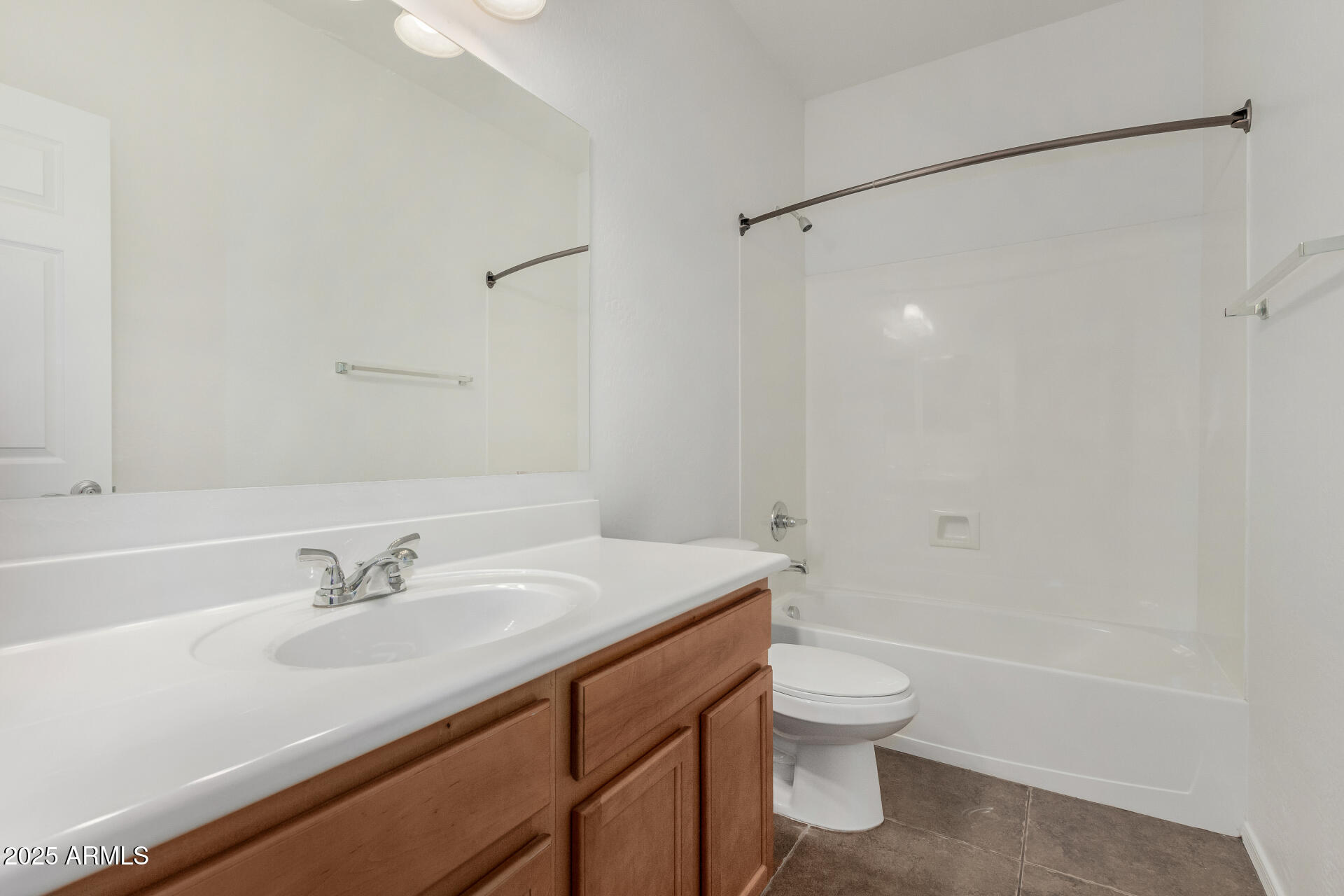 3313 West Gran Paradiso Drive Phoenix, AZ 85086 - Photo 24 of 31 a bathroom with a sink toilet and shower