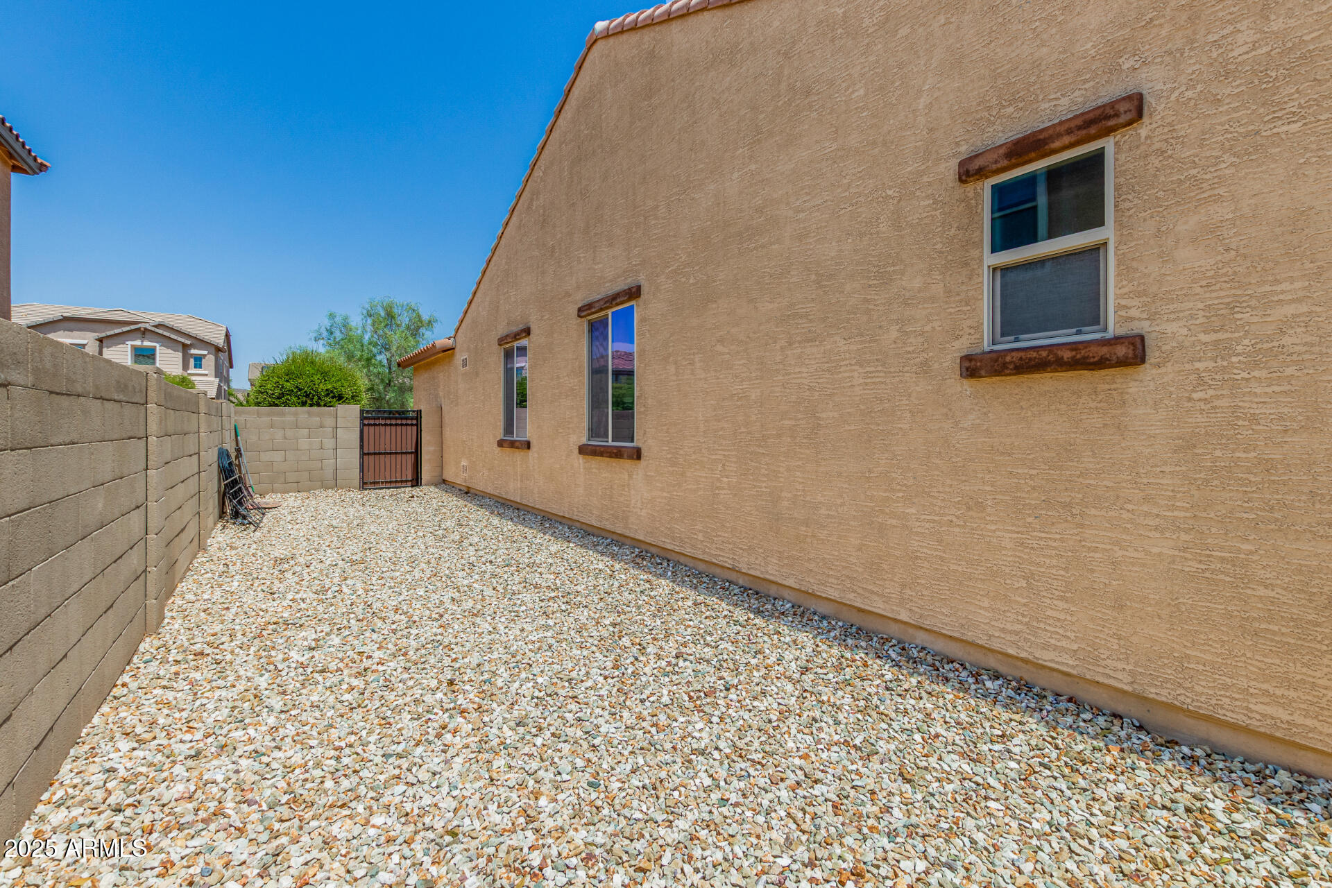 3313 West Gran Paradiso Drive Phoenix, AZ 85086 - Photo 31 of 31 a view of a house with a backyard
