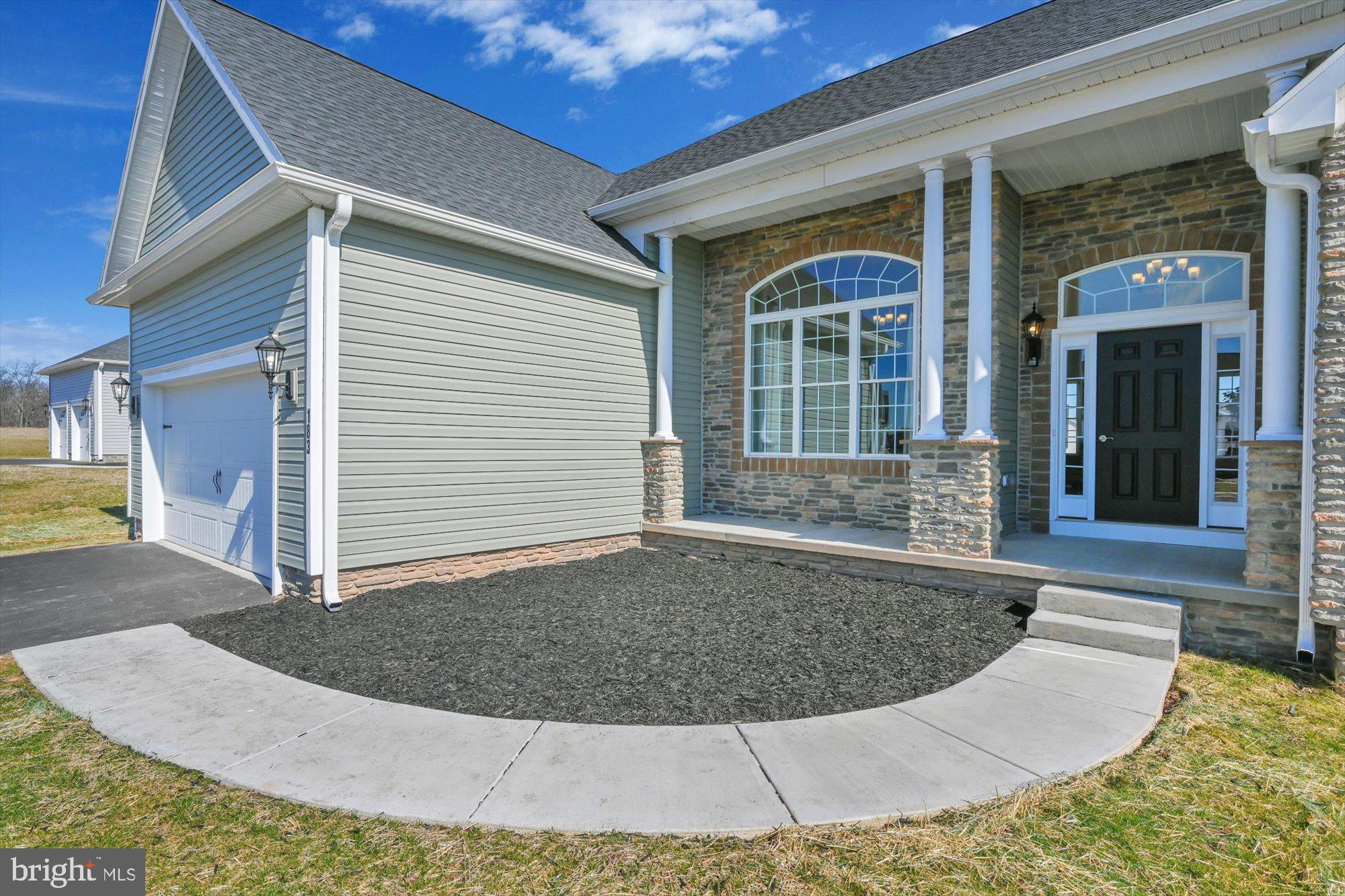 183 Fairplay Road, Unit 158 Gettysburg, PA 17325 - Photo 5 of 38 Curved sidewalk entry and landscape bed