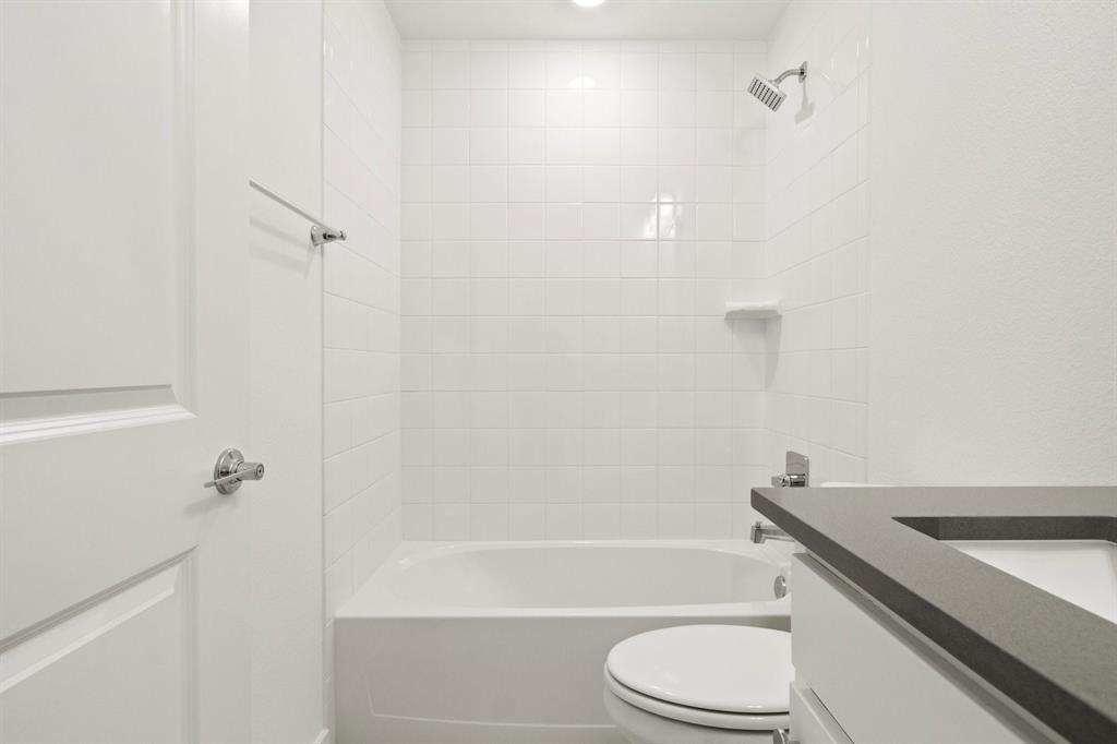 8513 Del Rio Trail Wylie, TX 75098 - Photo 23 of 33 a bathroom with a sink a toilet and shower