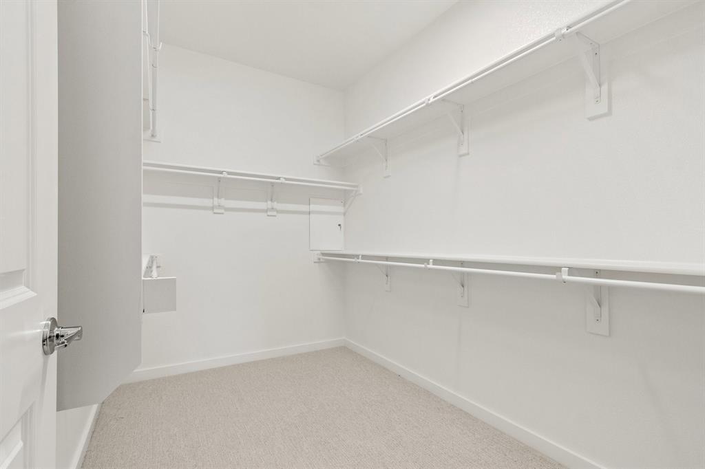 8513 Del Rio Trail Wylie, TX 75098 - Photo 27 of 33 a view of an empty walk in closet