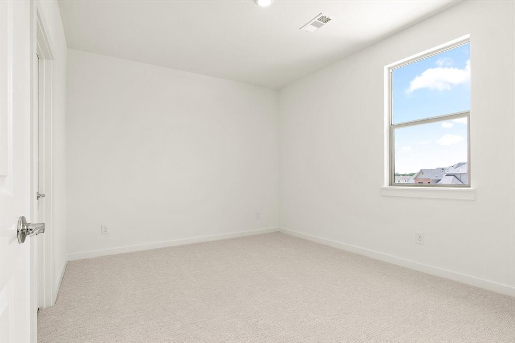 8513 Del Rio Trail Wylie, TX 75098 - Photo 28 of 33 an empty room with a window