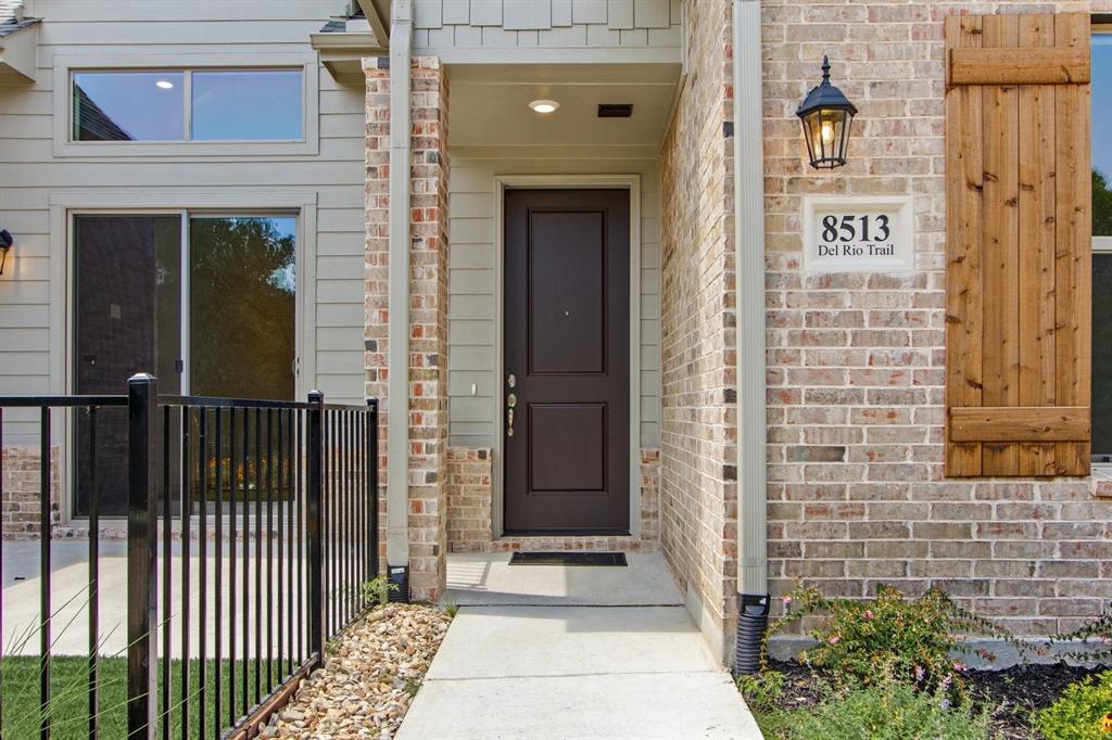 8513 Del Rio Trail Wylie, TX 75098 - Photo 3 of 33 a front view of a house with parking