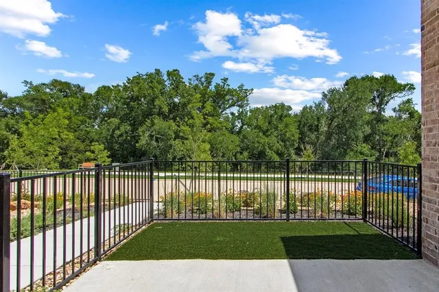 a view of a backyard with a garden