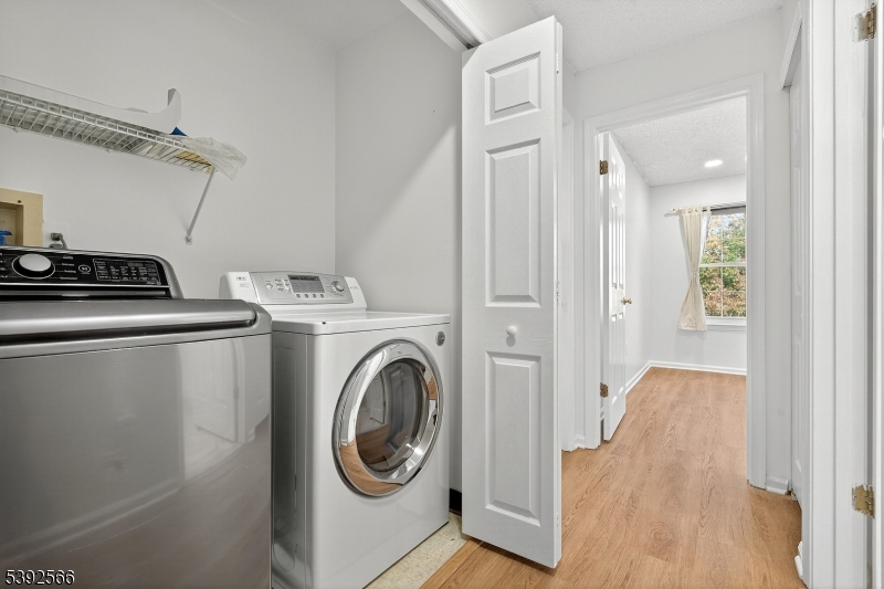 3509 French Drive, Unit 9 Bridgewater, NJ 08807 - Photo 13 of 22 a view of a storage & utility room with washer and dryer