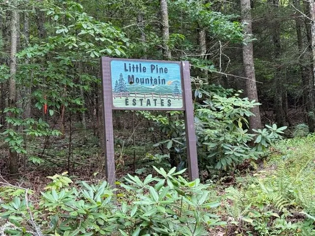 a sign on the side of a road