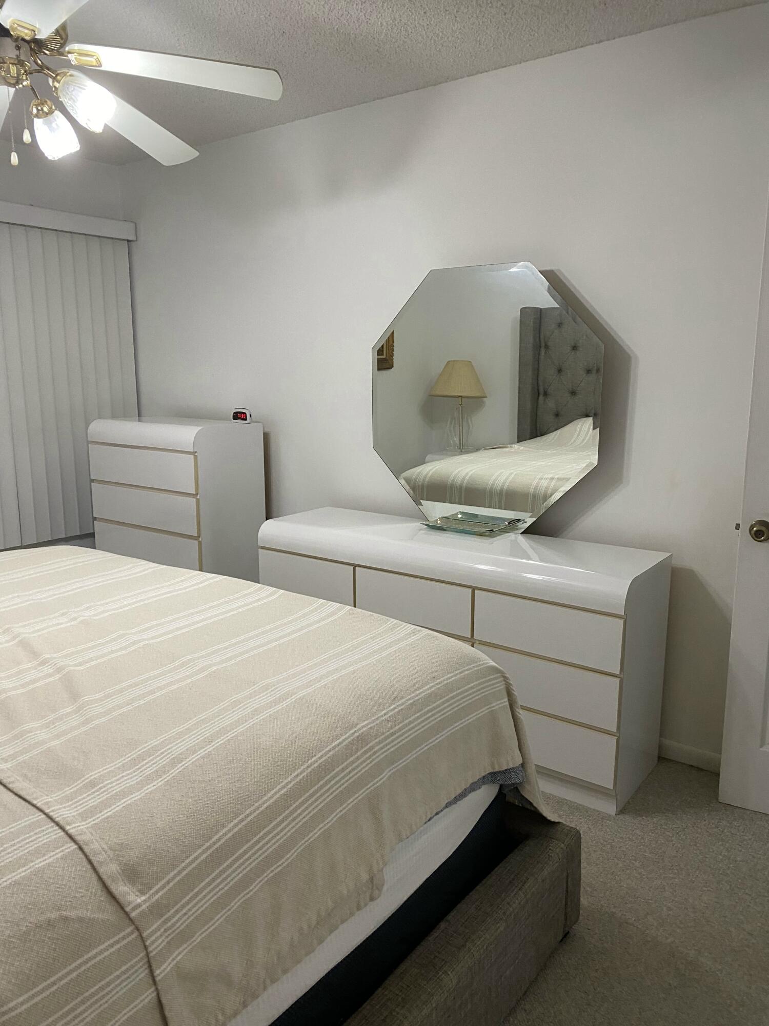415 Saxony Way, Unit 415 Delray Beach, FL 33446 - Photo 9 of 19 master bedroom reverse