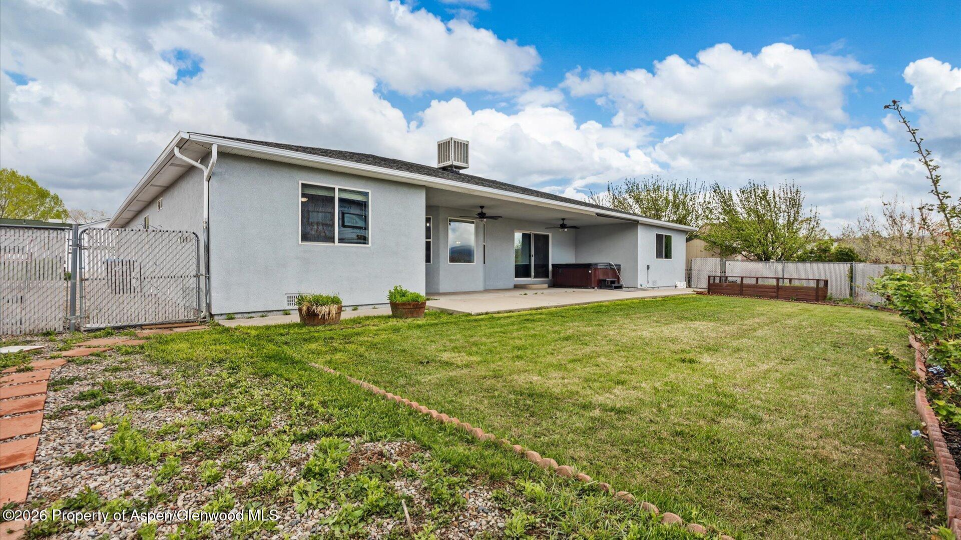 1459 Anvil View Avenue Rifle, CO 81650 - Photo 26 of 29 a front view of house with yard and green space