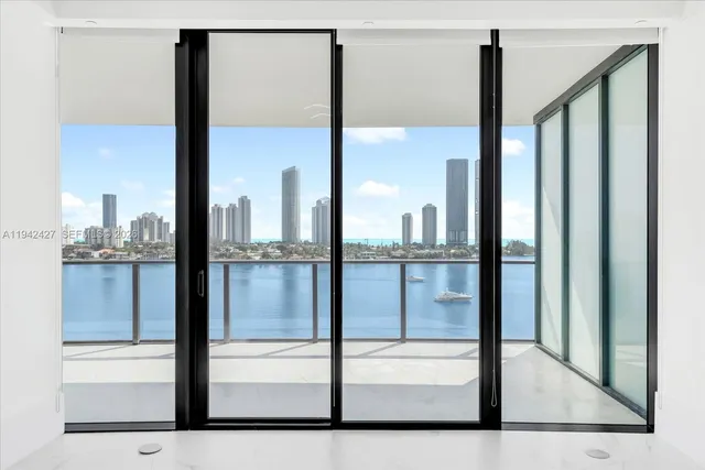 a view of a glass door front of a building