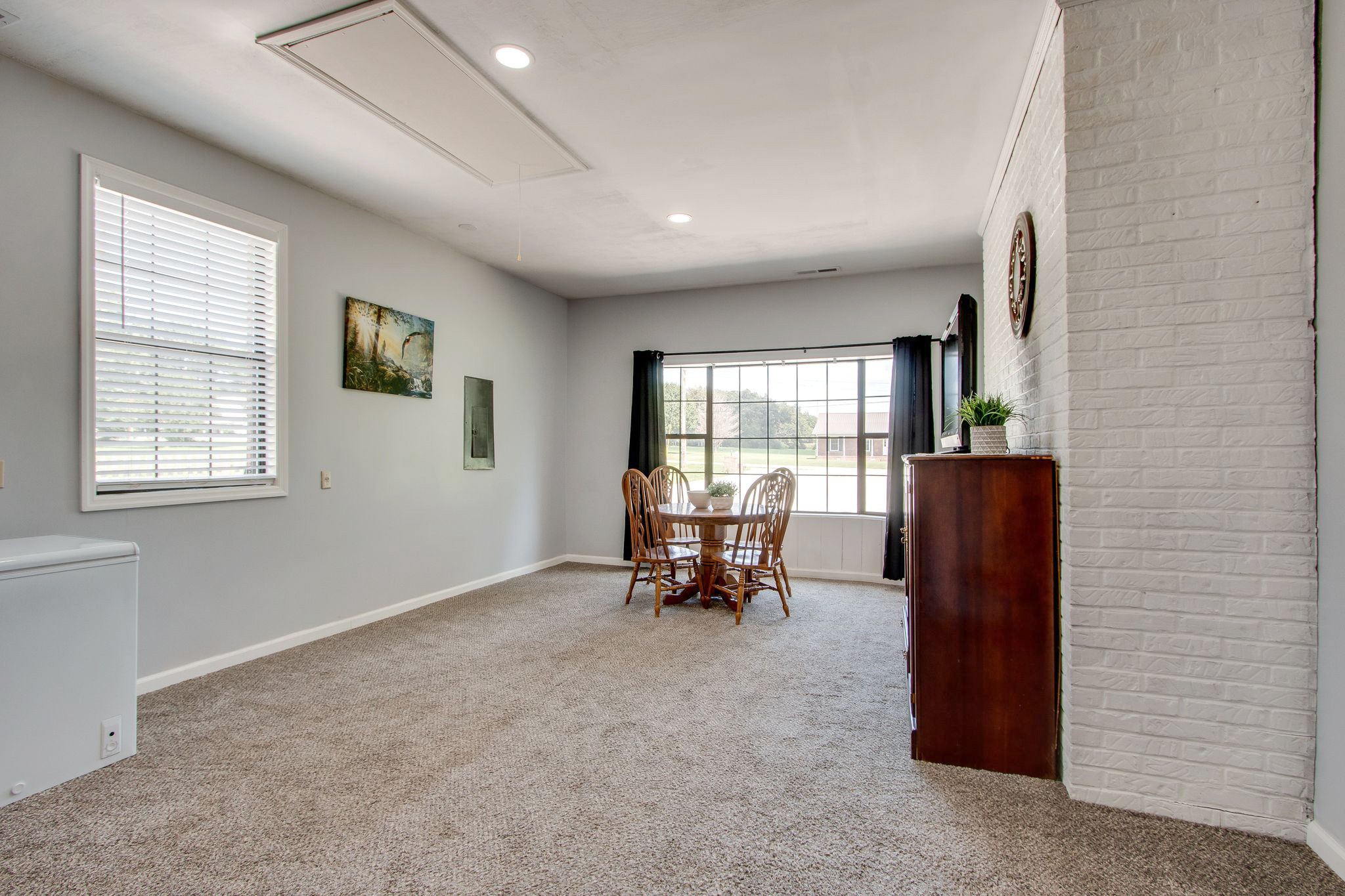 207 Eaton Heights Manchester, TN 37355 - Photo 16 of 37 a living room with furniture and a window