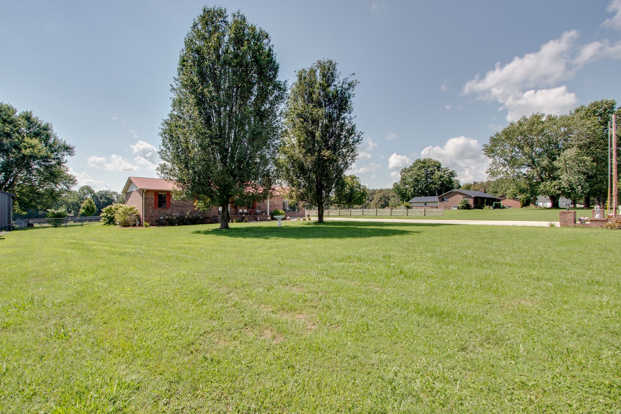 207 Eaton Heights Manchester, TN 37355 - Photo 2 of 37 a front view of a house with a yard