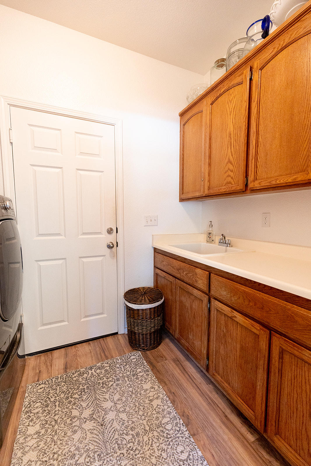 3363 Lawrence Road Redding, CA 96002 - Photo 13 of 33 a bathroom with a sink a toilet and mirror