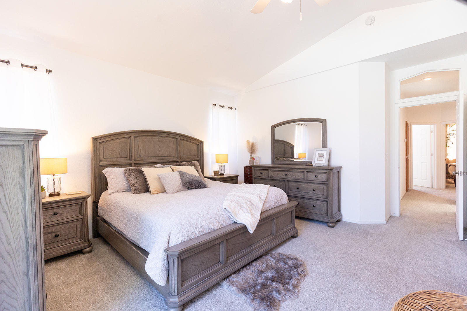 3363 Lawrence Road Redding, CA 96002 - Photo 15 of 33 a bedroom with a bed and a lamp on dresser