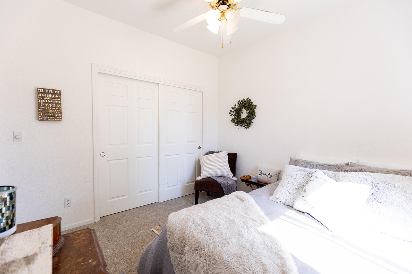 3363 Lawrence Road Redding, CA 96002 - Photo 23 of 33 a bedroom with a bed and a chandelier