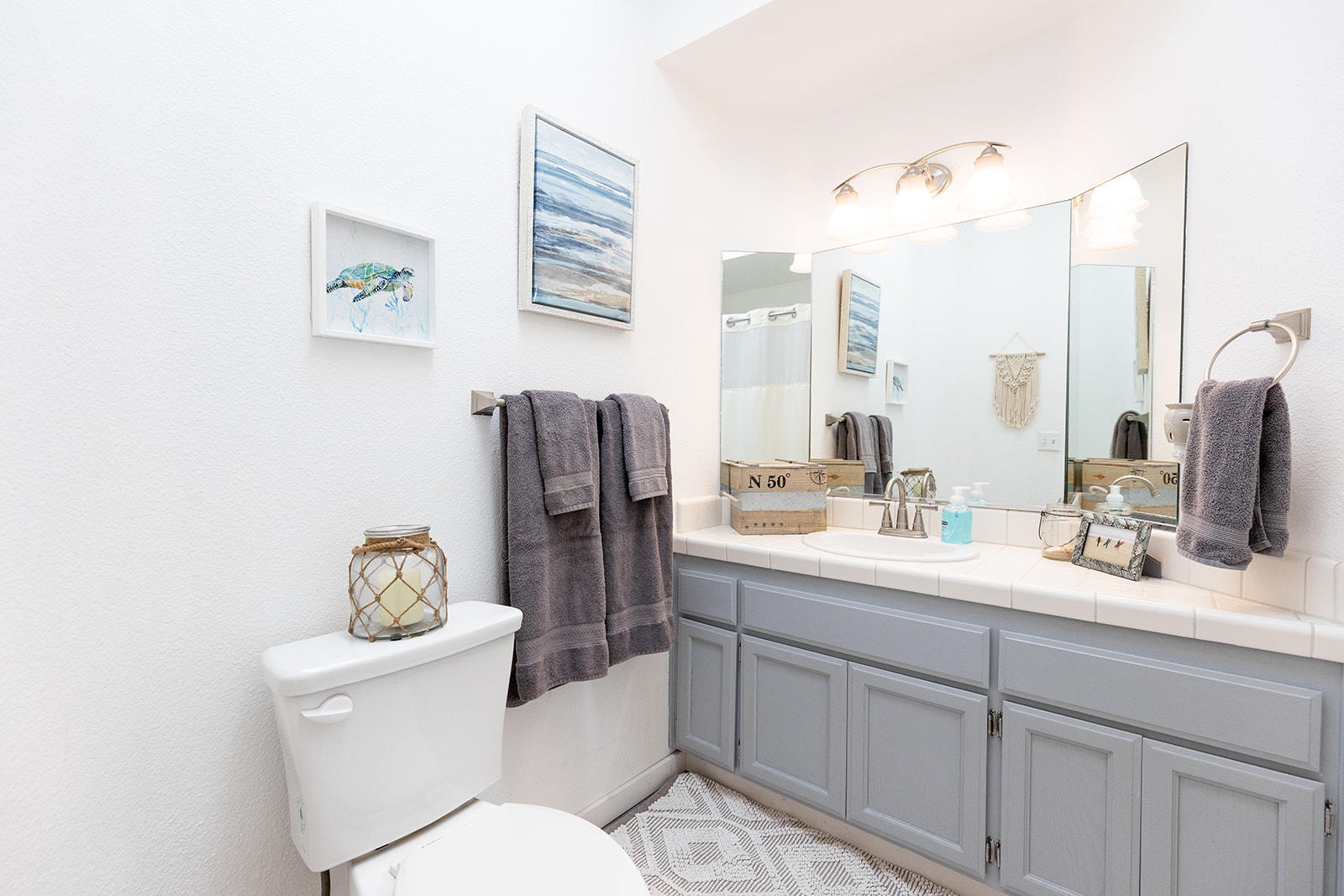 3363 Lawrence Road Redding, CA 96002 - Photo 25 of 33 a bathroom with a toilet sink and mirror