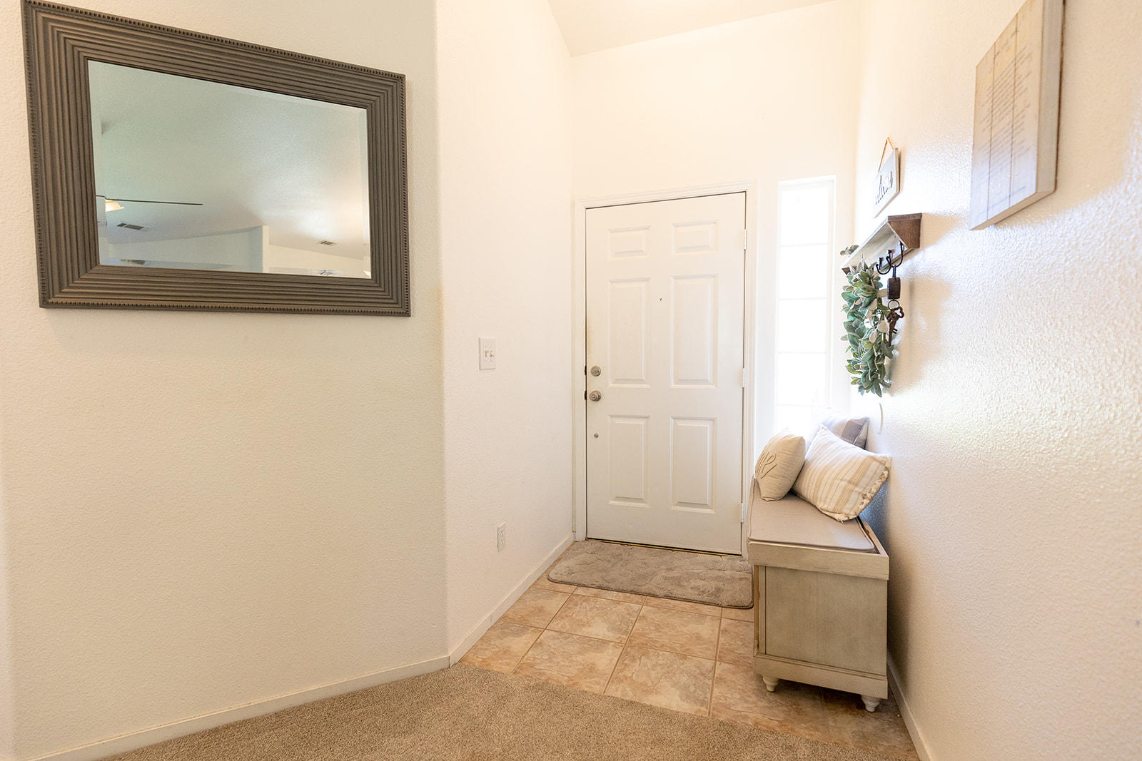 3363 Lawrence Road Redding, CA 96002 - Photo 5 of 33 a hallway with a door and a mirror