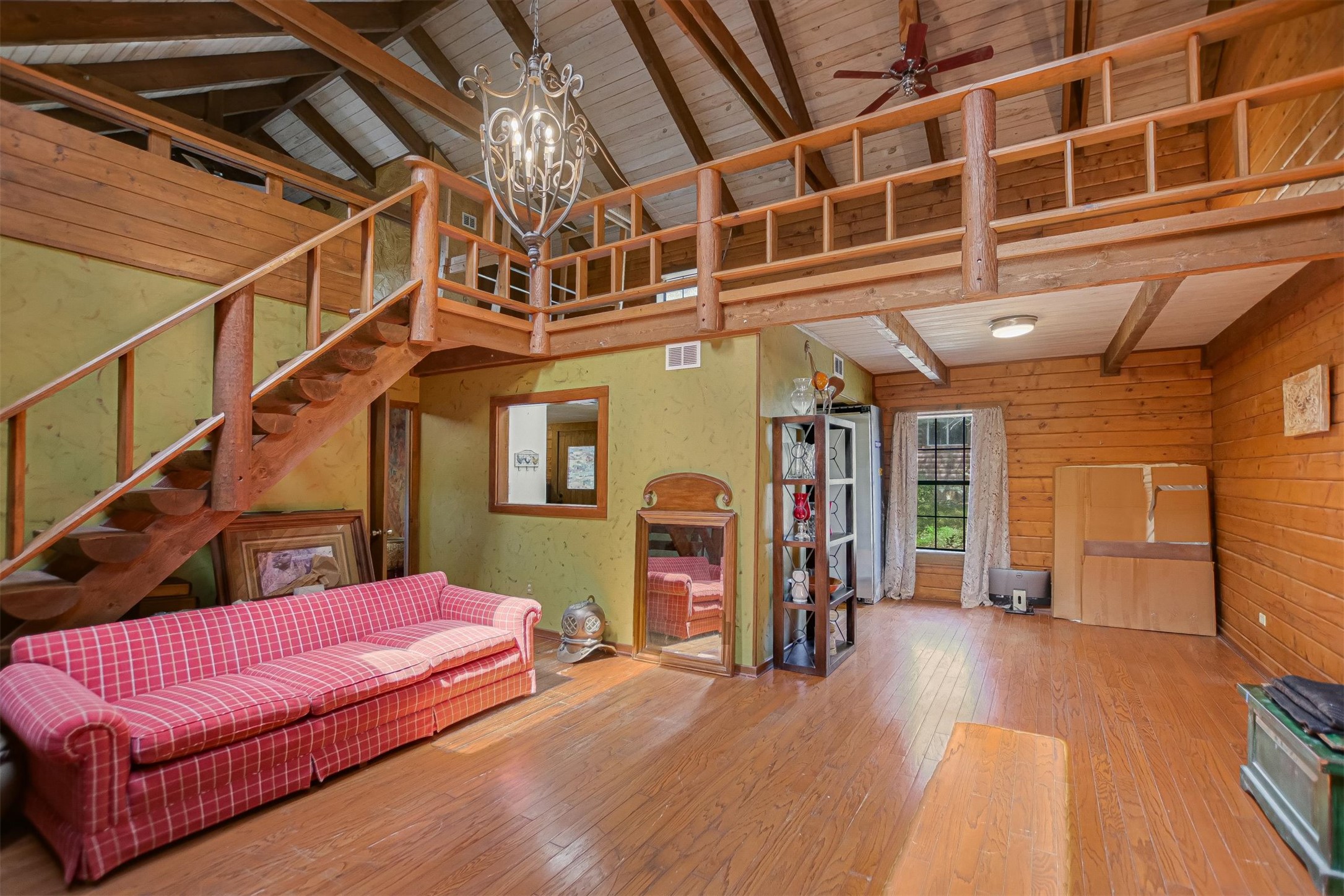 12711 Rr, Unit 12 Wimberley, TX 78676 - Photo 5 of 20 Two-story beamed ceilings create an open, expansive feel within the main living area