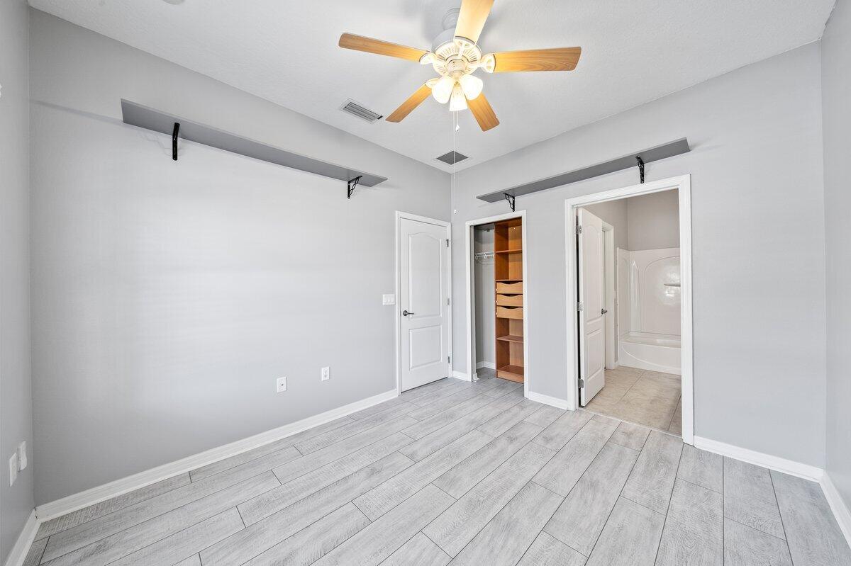 2980 Le Conte Street Melbourne, FL 32940 - Photo 14 of 25 a view of an empty room with a window