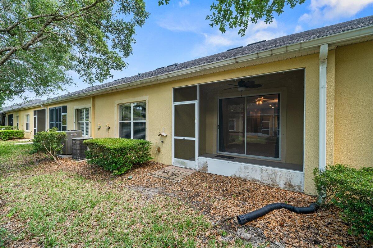 2980 Le Conte Street Melbourne, FL 32940 - Photo 25 of 25 a front view of a house with garden