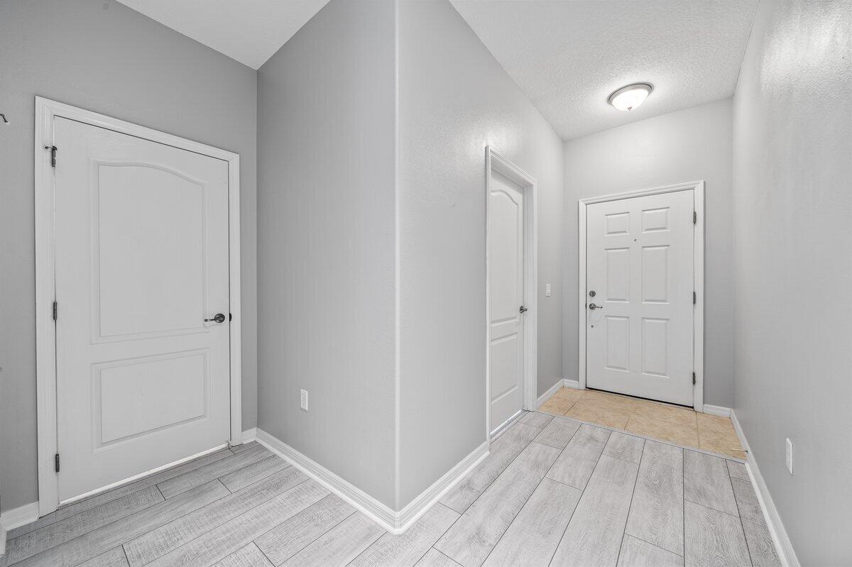 2980 Le Conte Street Melbourne, FL 32940 - Photo 5 of 25 a view of a room with wooden floor