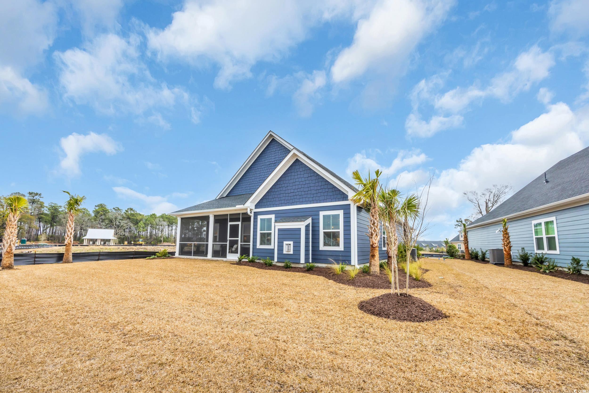2341 Hazel Way Longs, SC 29568 - Photo 31 of 39 View of front of house with a sunroom and a front