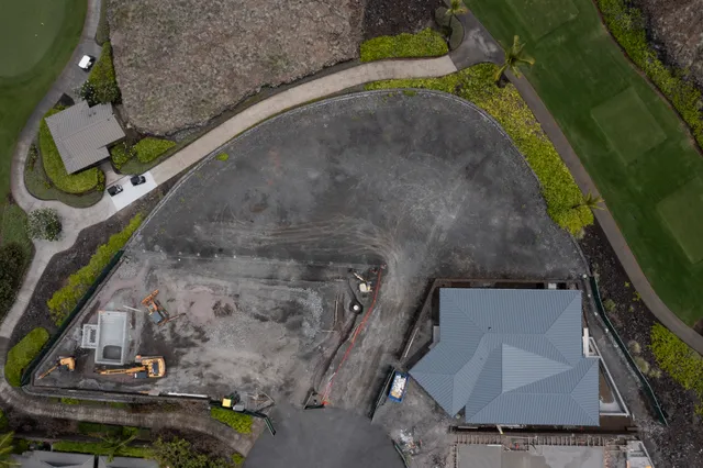 a view of a lake with a city