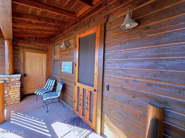 a view of chairs in the balcony