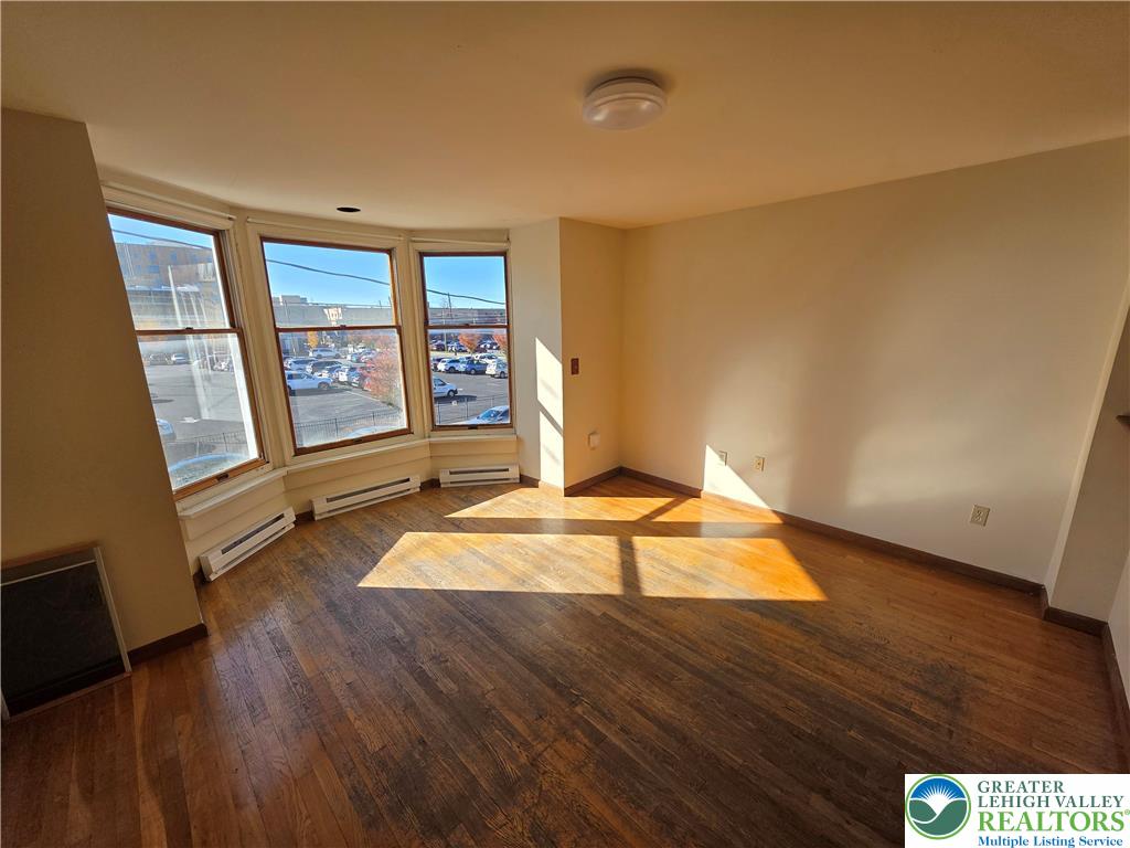 337 North 16th Street, Unit 2 Allentown, PA 18102 - Photo 4 of 13 a room with wooden floor and pool table