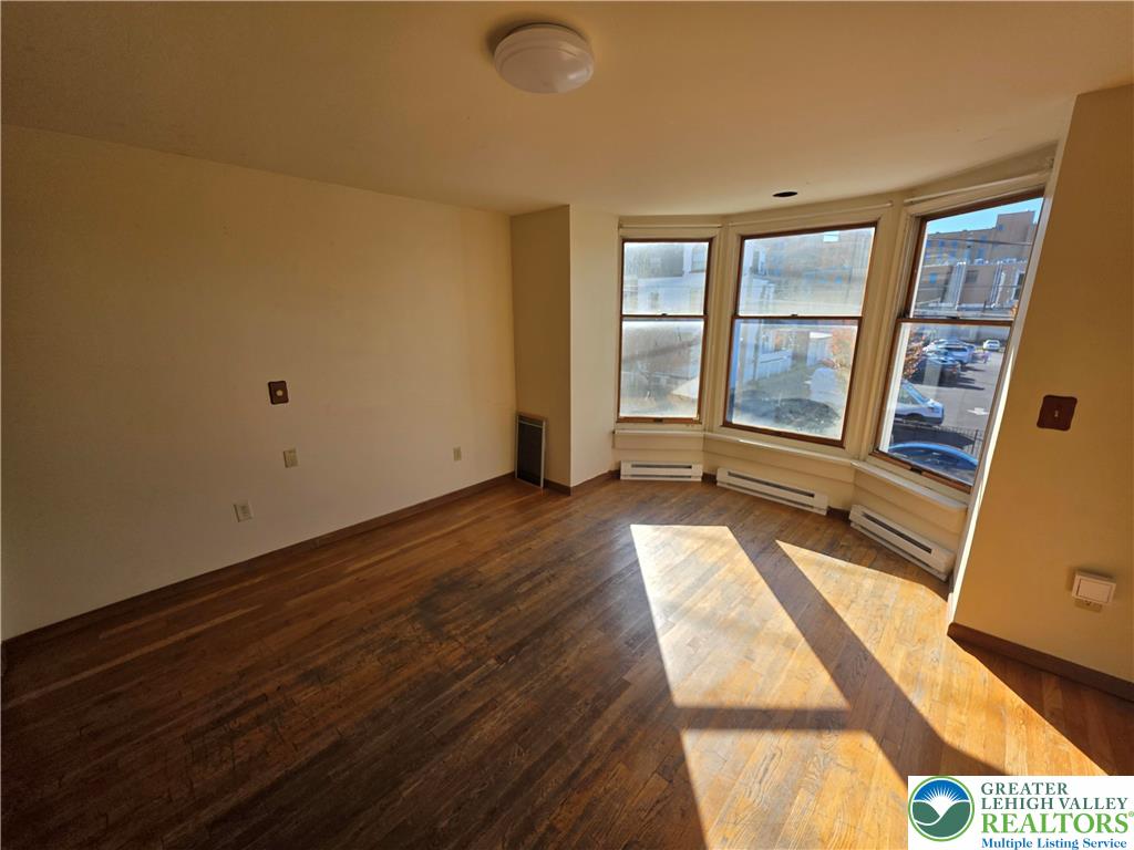 337 North 16th Street, Unit 2 Allentown, PA 18102 - Photo 5 of 13 a view of an empty room and a window
