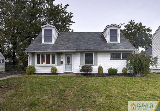 52 Sturgis Road Edison, NJ 08817 - Photo 1 of 22 a front view of a house with a yard