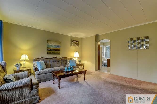52 Sturgis Road Edison, NJ 08817 - Photo 14 of 22 a living room with furniture and a couch