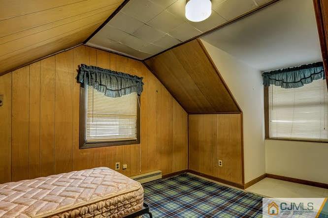 52 Sturgis Road Edison, NJ 08817 - Photo 21 of 22 a bedroom with a bed and a window