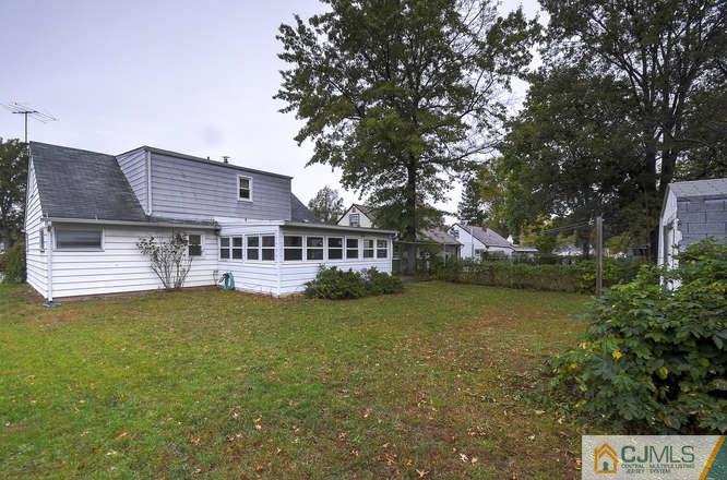 52 Sturgis Road Edison, NJ 08817 - Photo 5 of 22 a view of a house with a yard